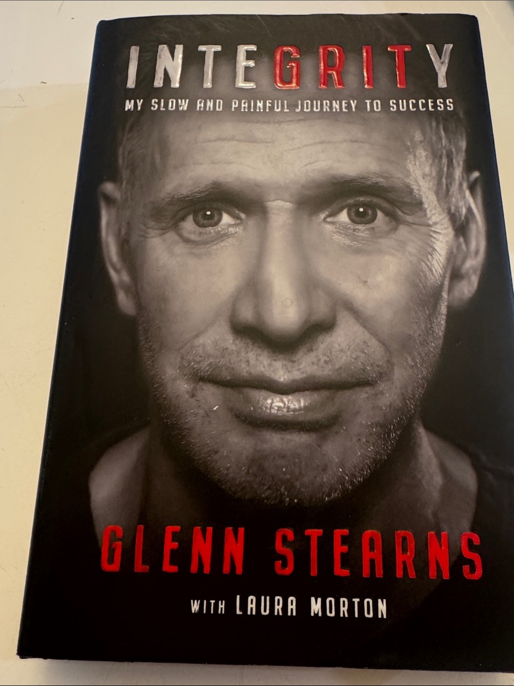 Integrity by Glenn Stearns Hardcover Book - Black & Red